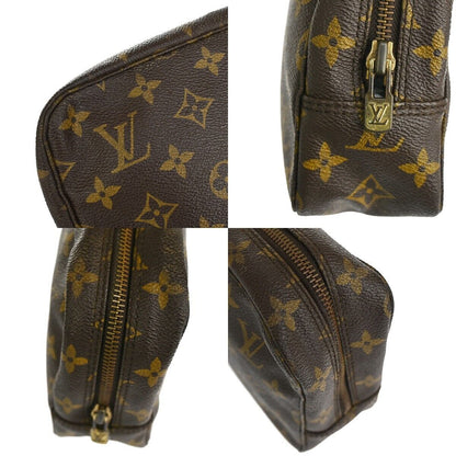 Louis Vuitton Trousse pochette Clutch