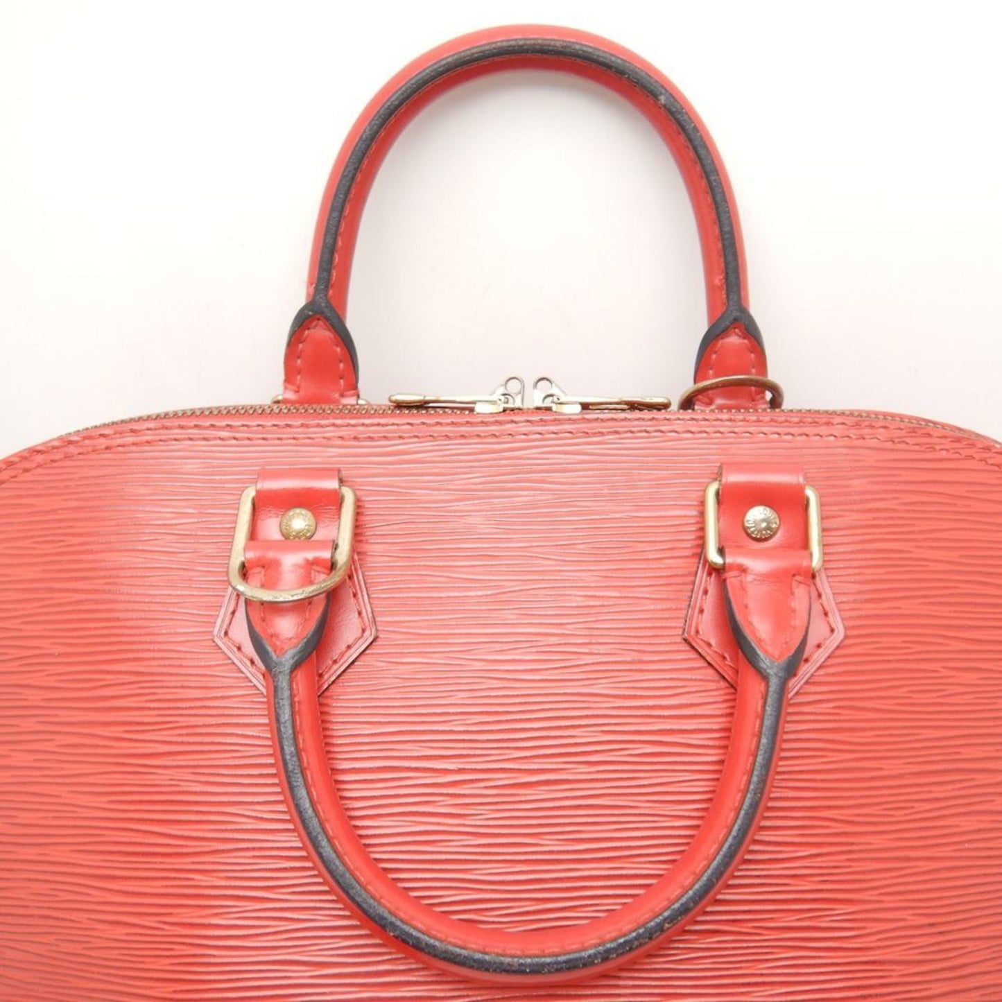 Louis Vuitton Alma Handbag