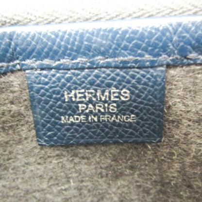 Hermès -- Clutch