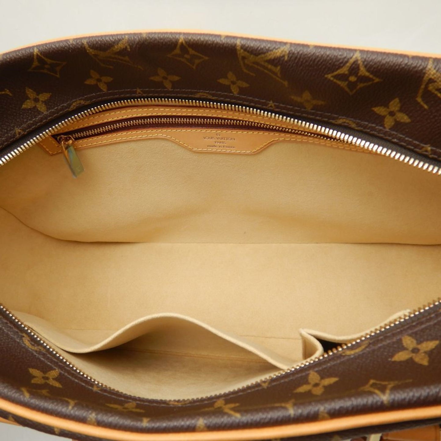 Louis Vuitton Cité Shoulder Bag