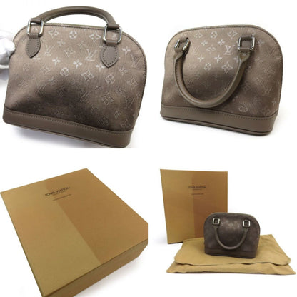 Louis Vuitton Alma Handbag