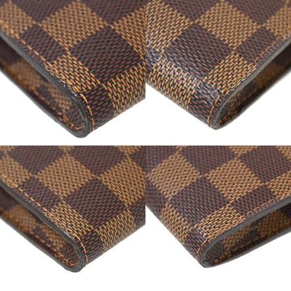 Louis Vuitton Trousse de Toilette Clutch