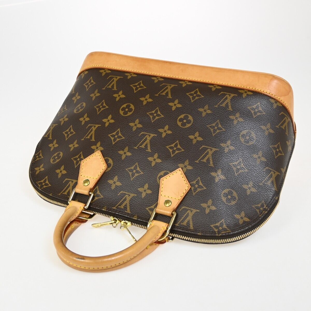 Louis Vuitton Alma Handbag