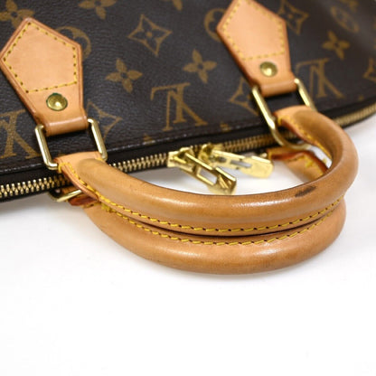 Louis Vuitton Alma Handbag