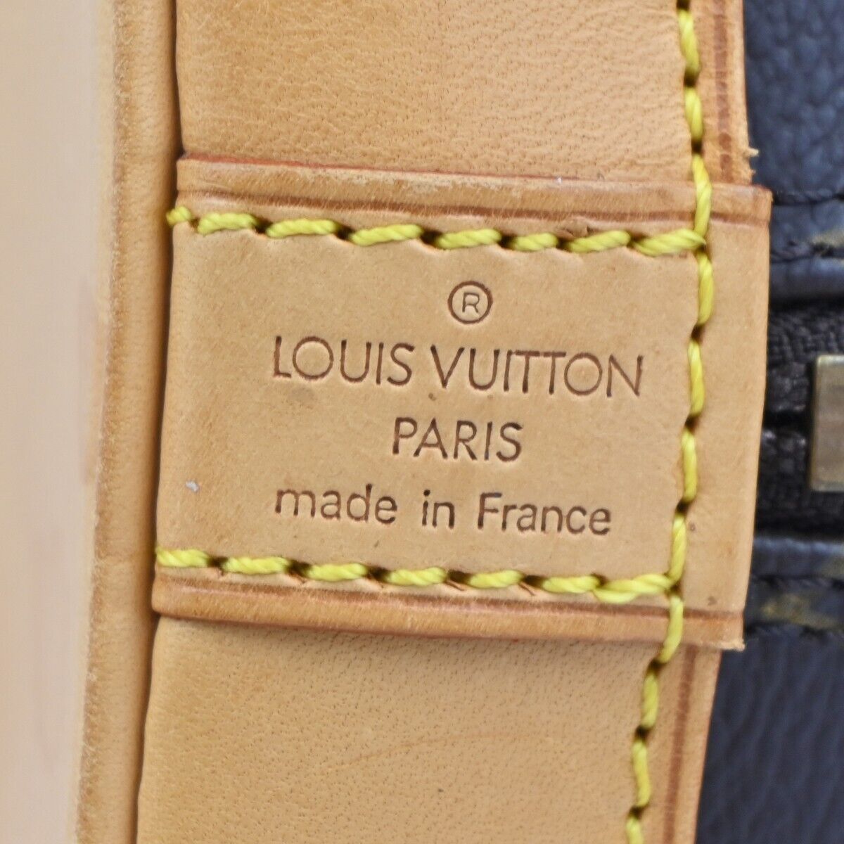 Louis Vuitton Alma Handbag