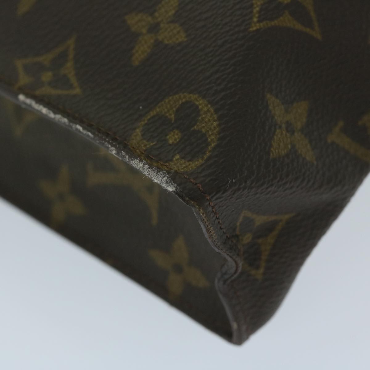 Louis Vuitton Trousse de Toilette Clutch