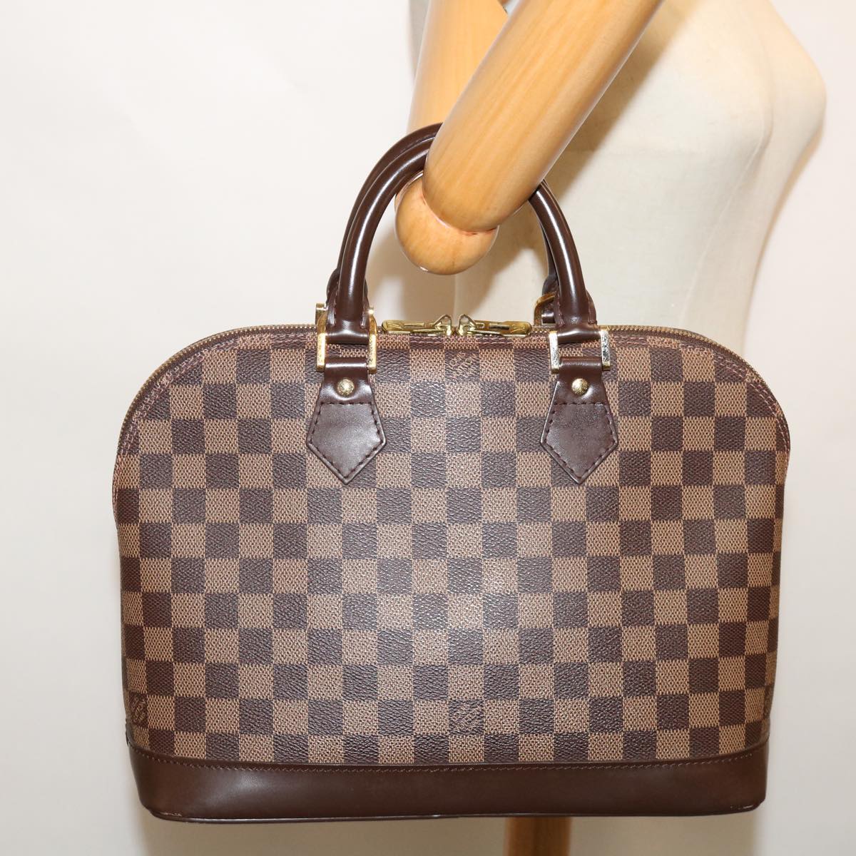 Louis Vuitton Alma Handbag