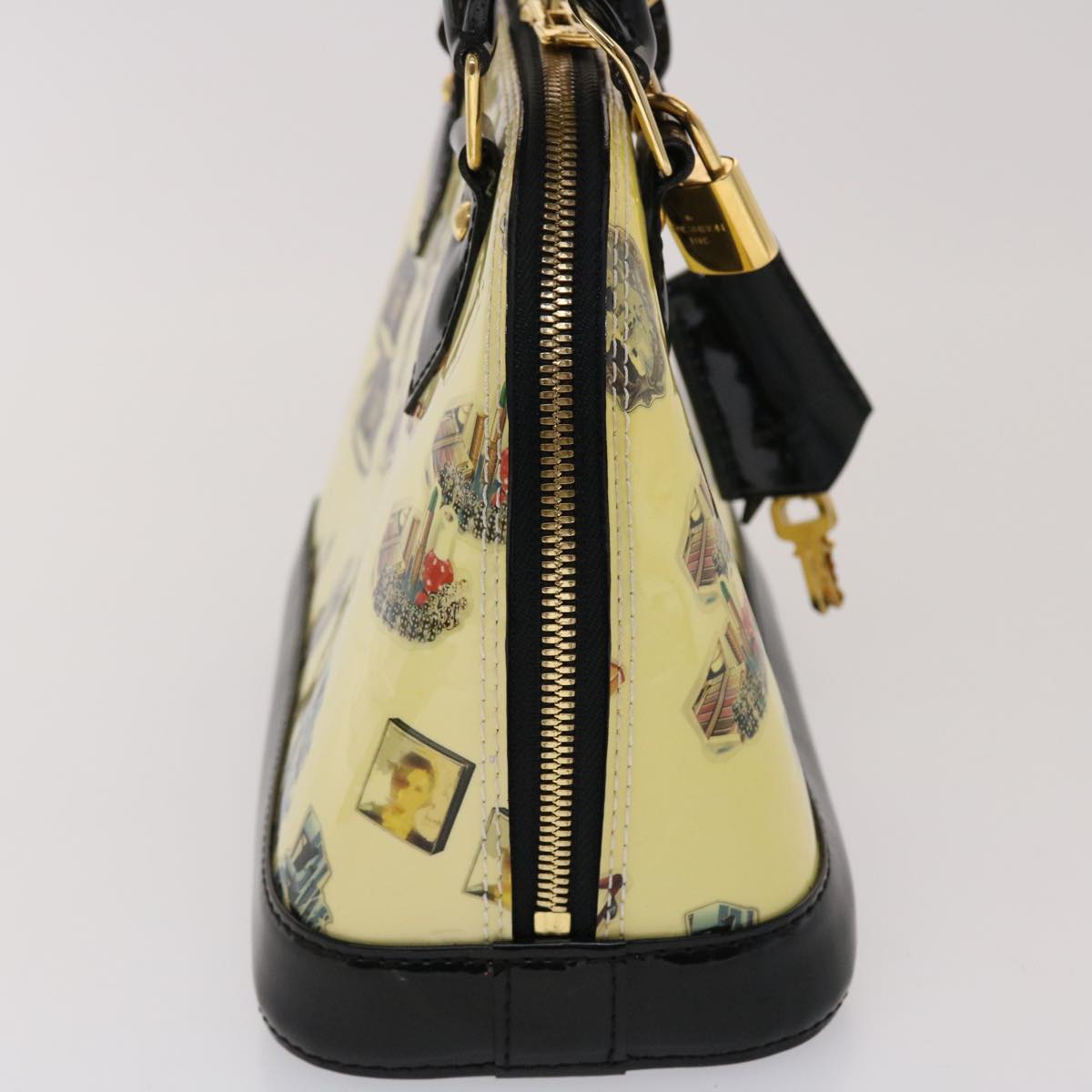 Louis Vuitton Alma Handbag