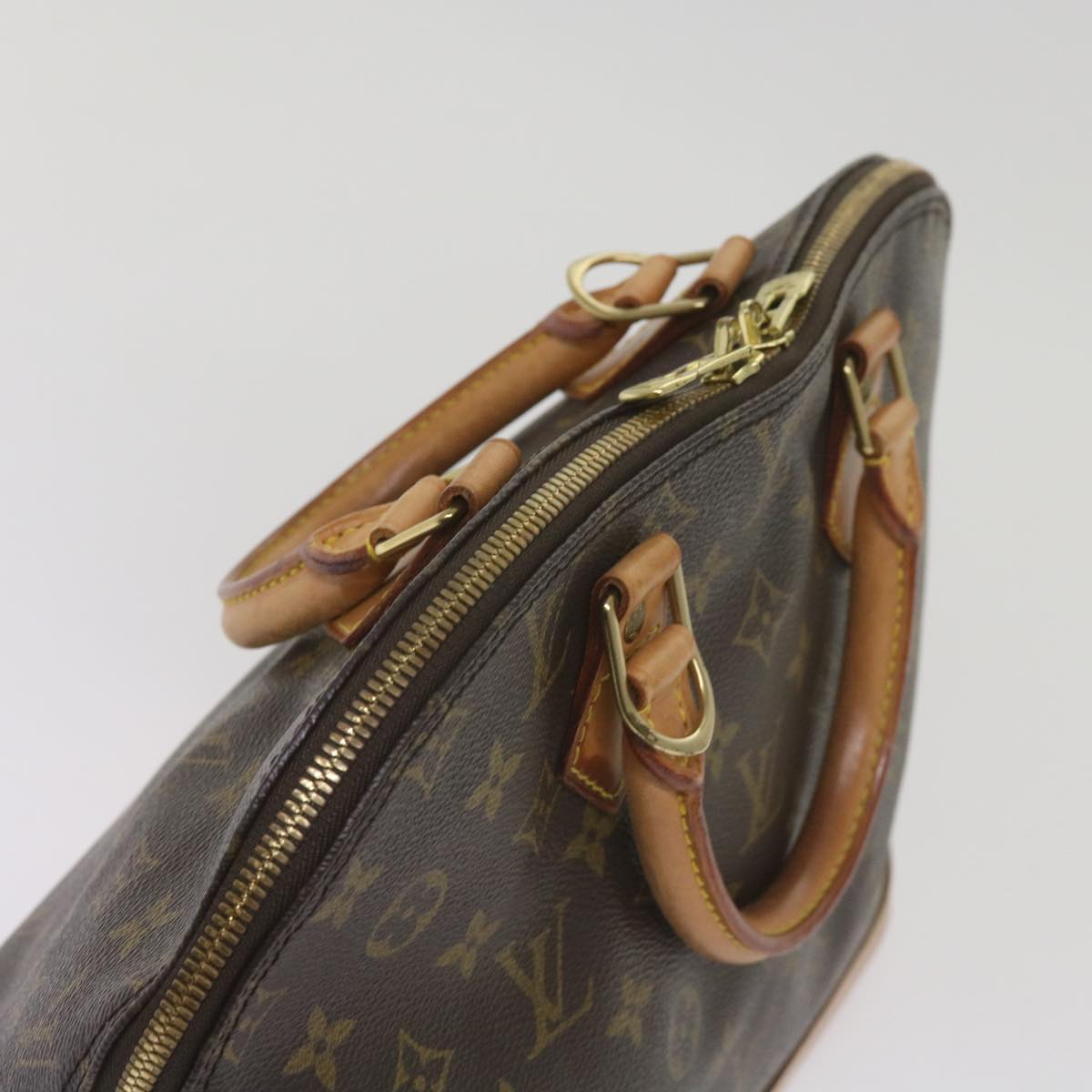 Louis Vuitton Alma Handbag