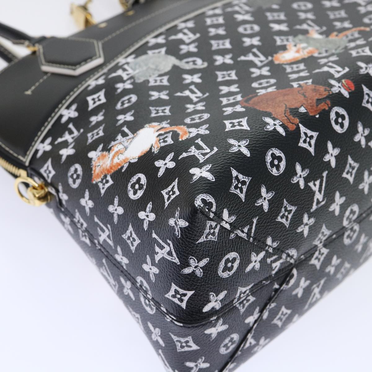 Louis Vuitton Alma Handbag