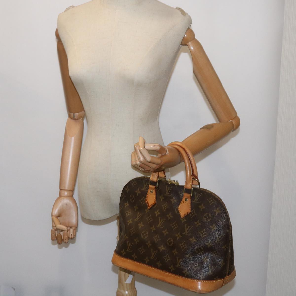 Louis Vuitton Alma Handbag