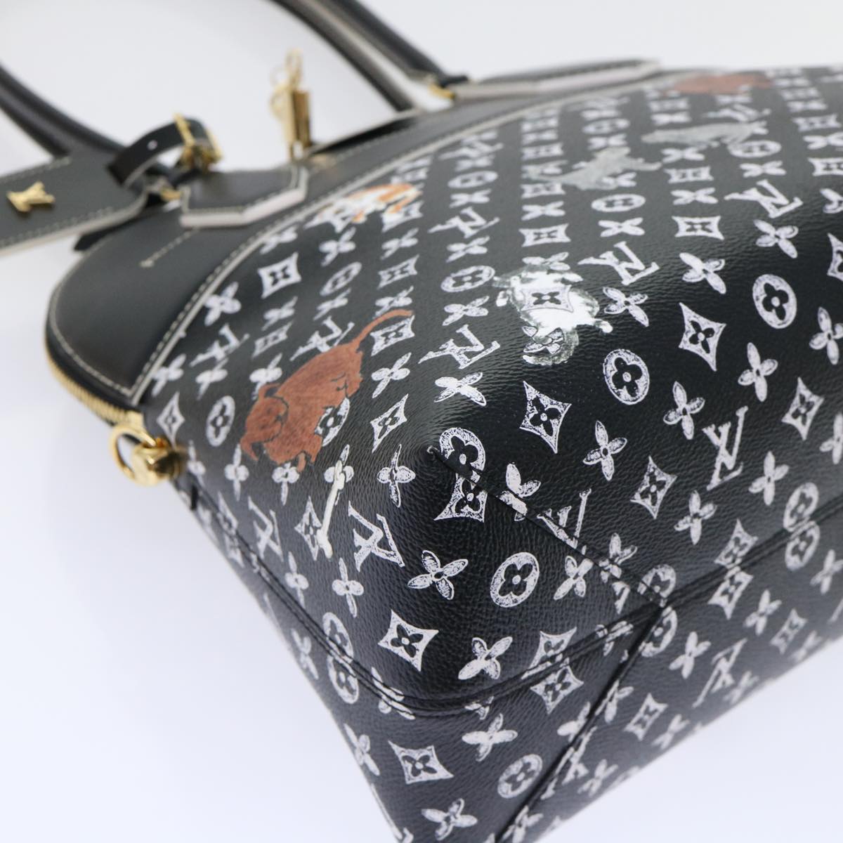 Louis Vuitton Alma Handbag