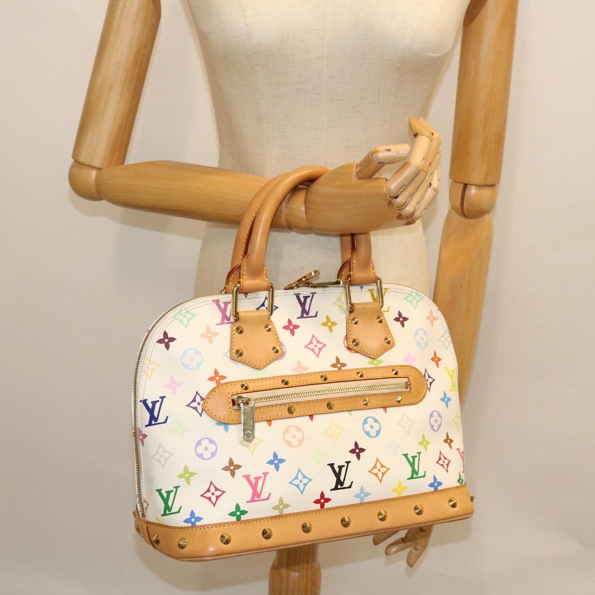 Louis Vuitton Alma Handbag