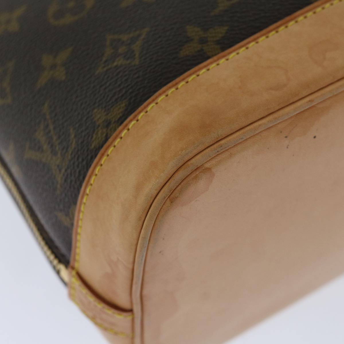 Louis Vuitton Alma Handbag