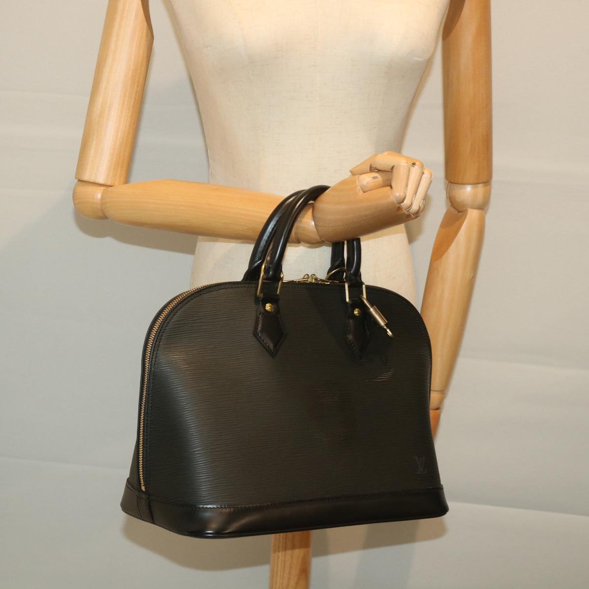 Louis Vuitton Alma Handbag