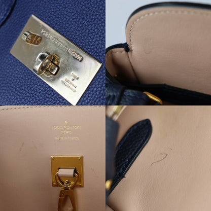 Louis Vuitton Milla Handbag