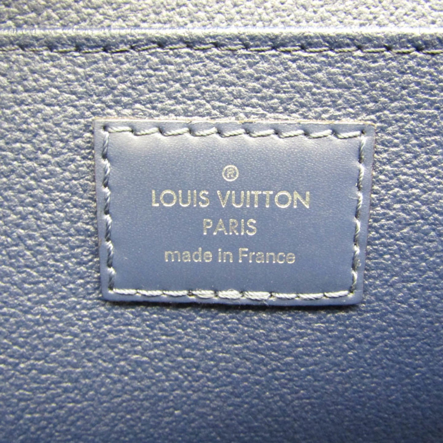 Louis Vuitton Poche Toilette Clutch