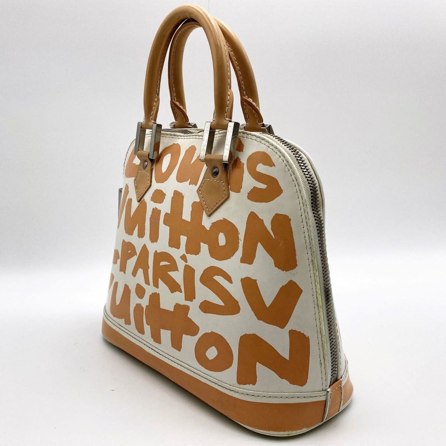 Louis Vuitton Alma Handbag