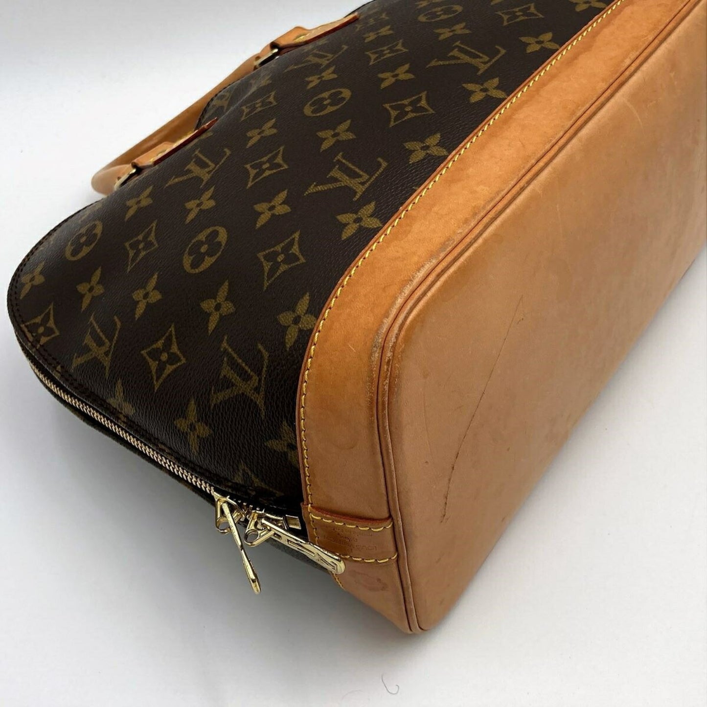 Louis Vuitton Alma Handbag