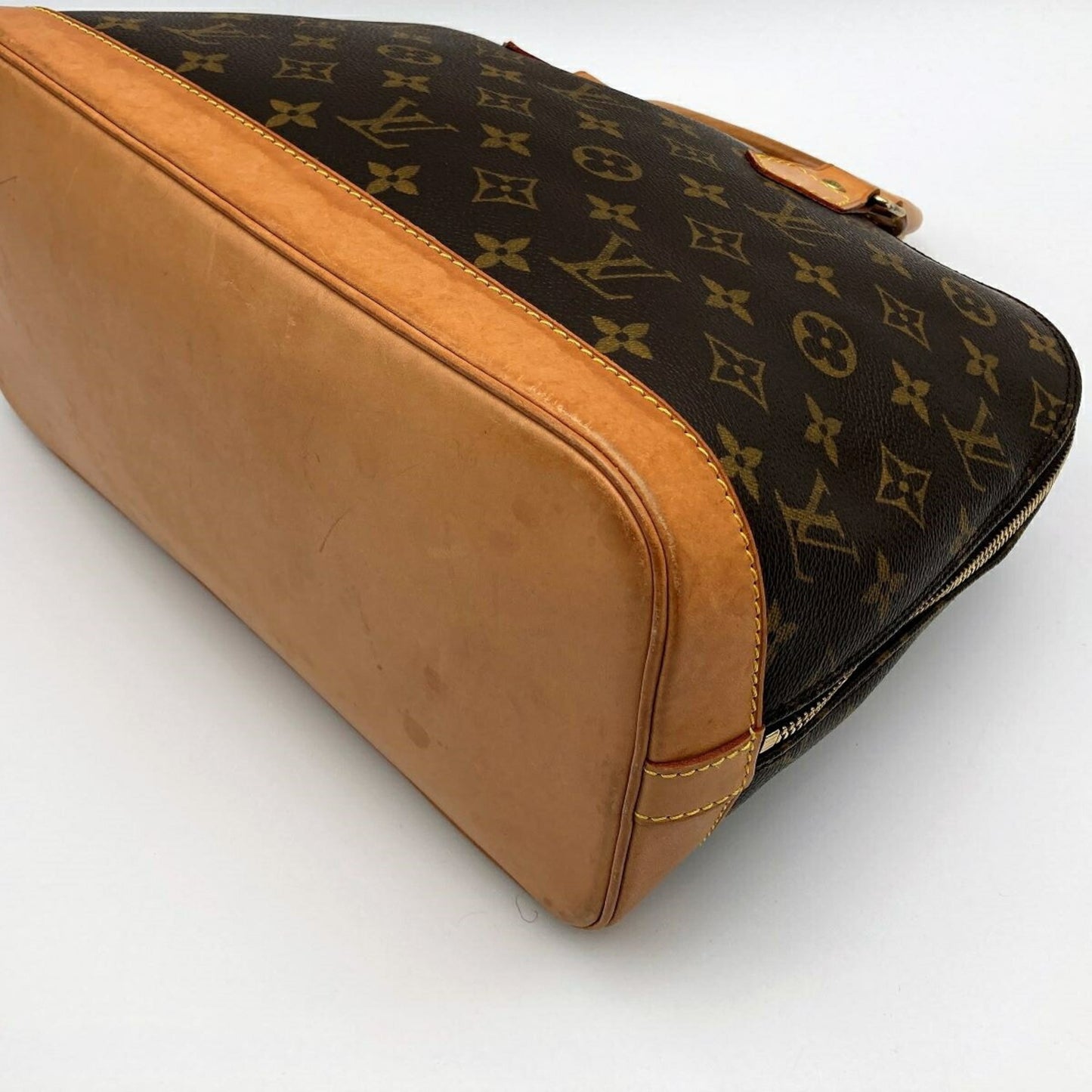 Louis Vuitton Alma Handbag