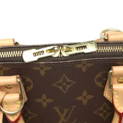 Louis Vuitton Alma Handbag