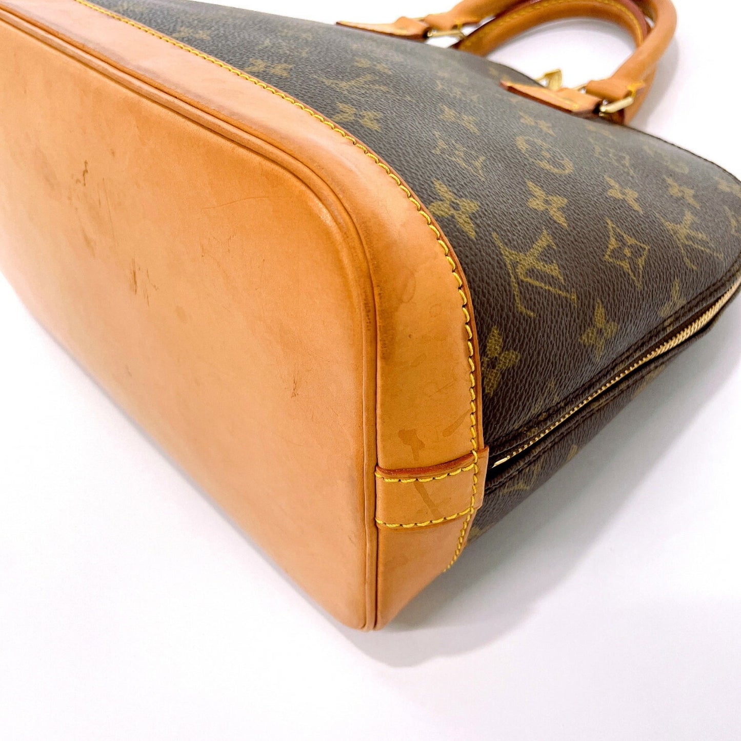 Louis Vuitton Alma Handbag