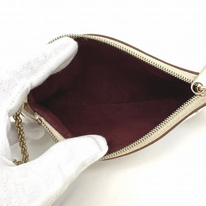 Louis Vuitton Milla Clutch