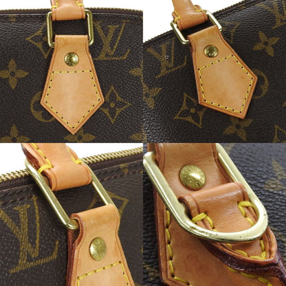 Louis Vuitton Alma Handbag