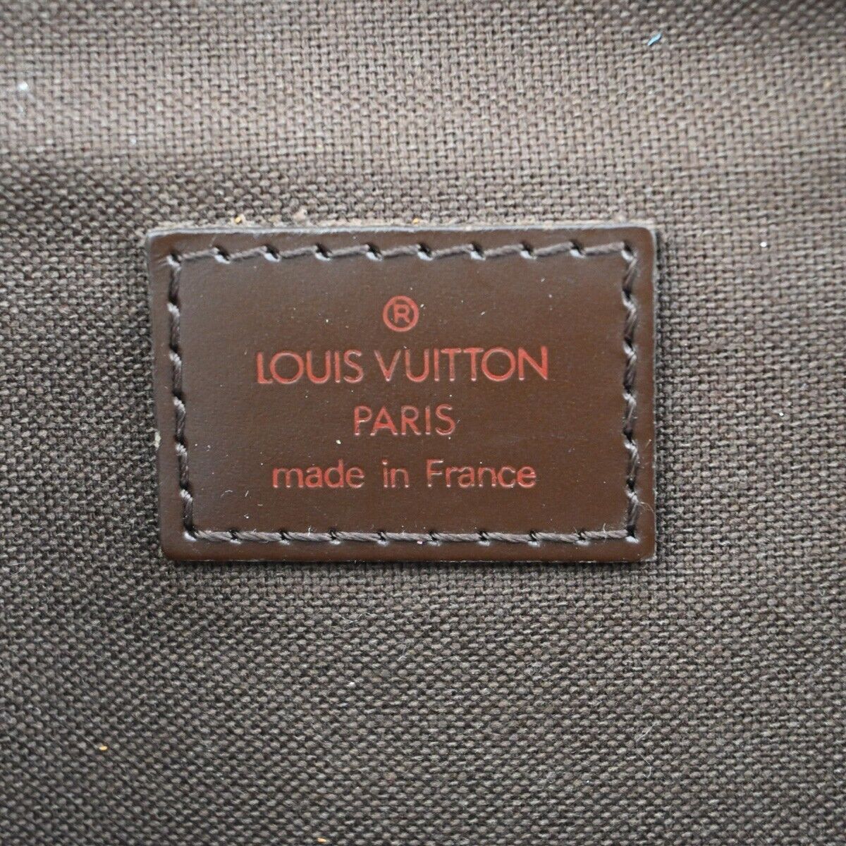 Louis Vuitton Melville Clutch