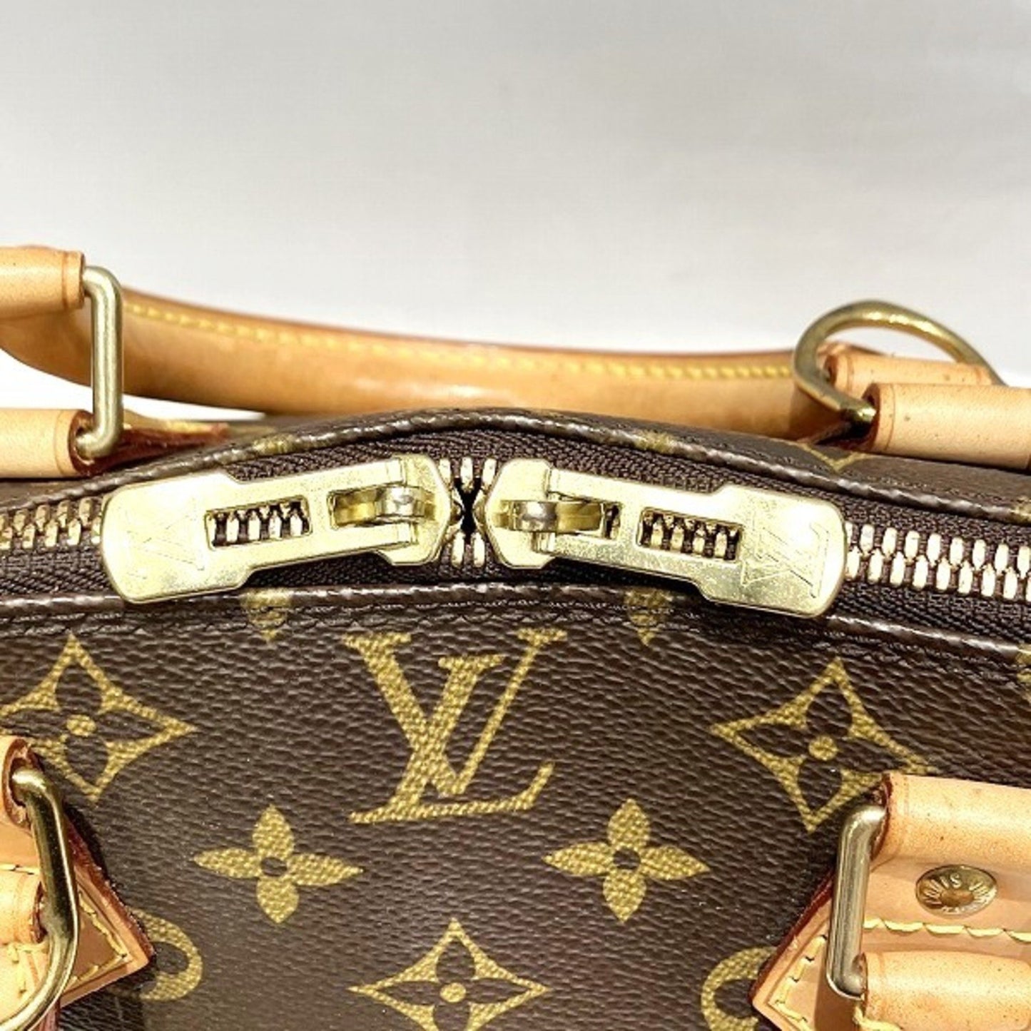 Louis Vuitton Alma Handbag