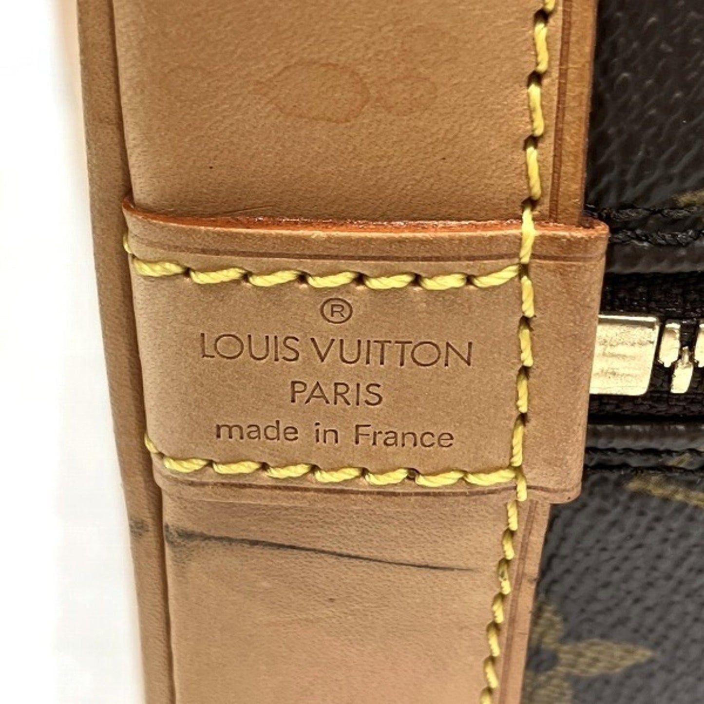 Louis Vuitton Alma Handbag