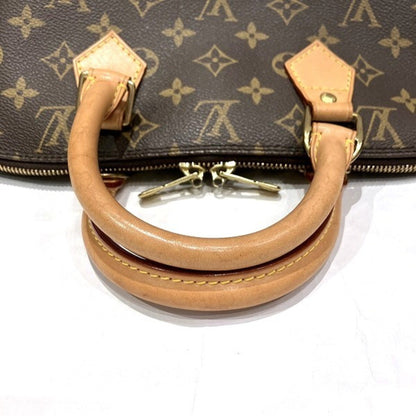 Louis Vuitton Alma Handbag