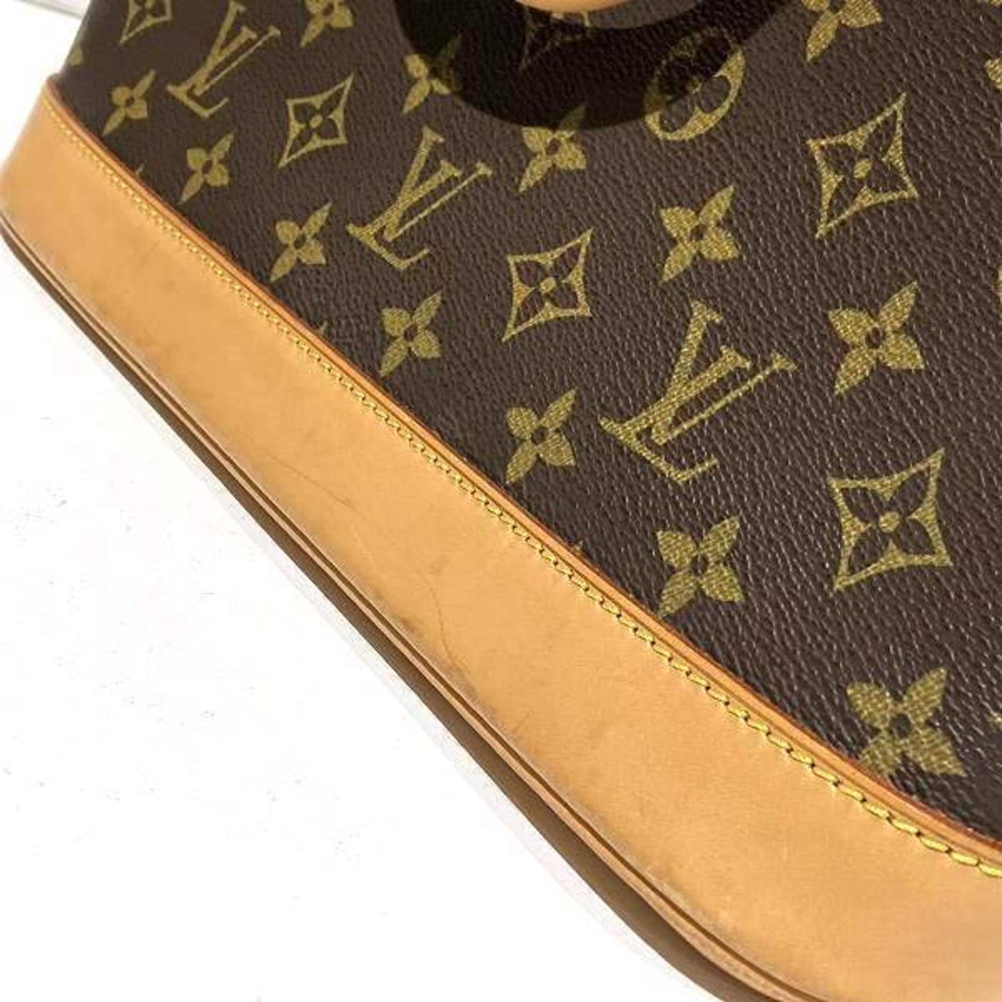 Louis Vuitton Alma Handbag