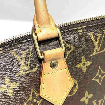 Louis Vuitton Alma Handbag