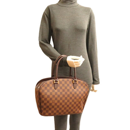 Louis Vuitton Sarria Handbag