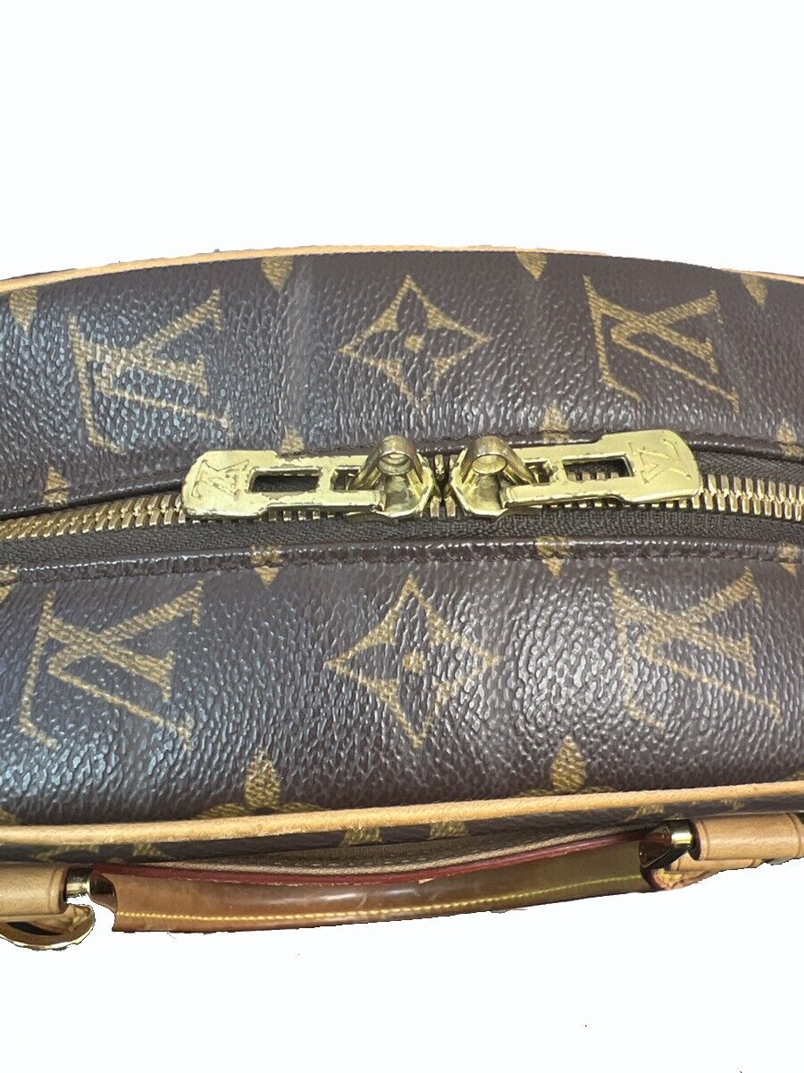 Louis Vuitton Nolita Handbag